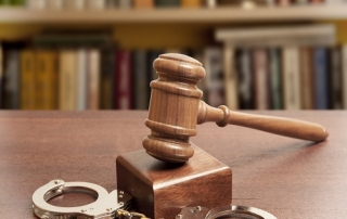 gavel and handcuffs, first time in prison
