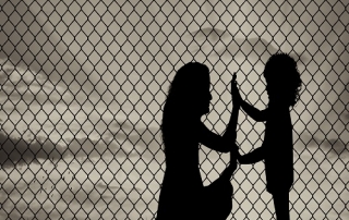 Silhouette of mother and child